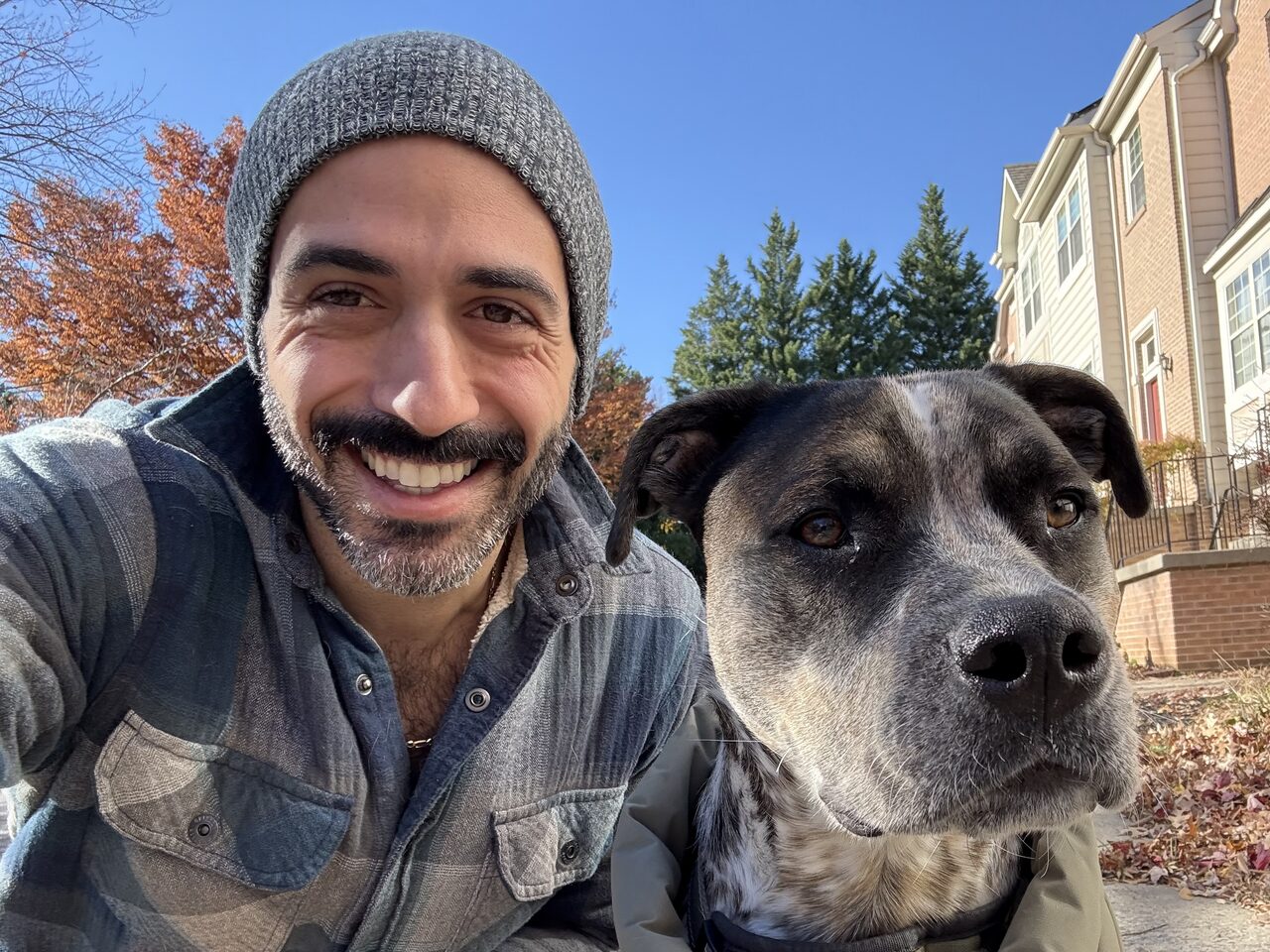 Jason Dorn, founder of EZdoc, with his dog Zuma
